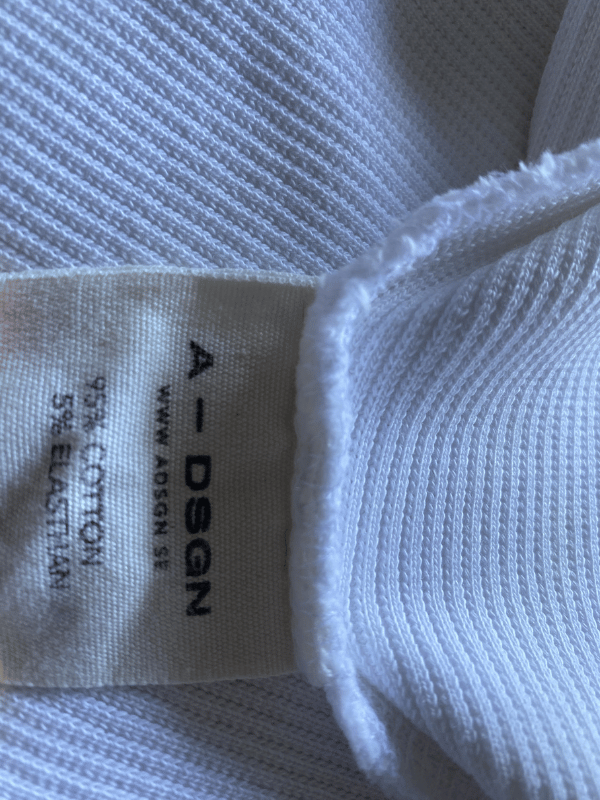 A-DSGN White Ribbed Off-Shoulder Long Sleeve Top